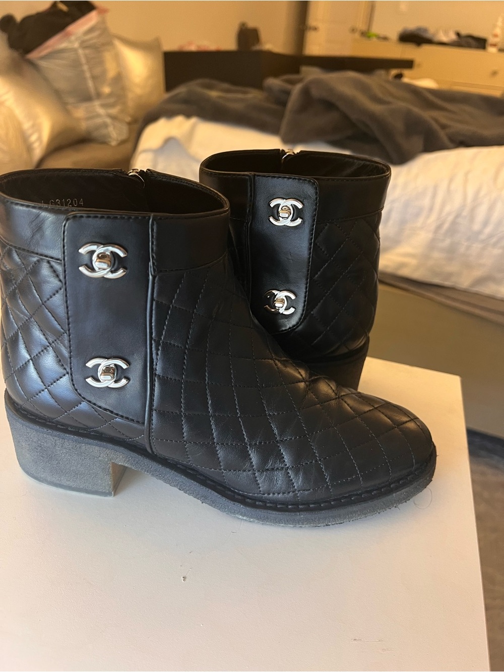 CHANEL Black Quilted Leather Ankle Booties with Silver CC Buttons